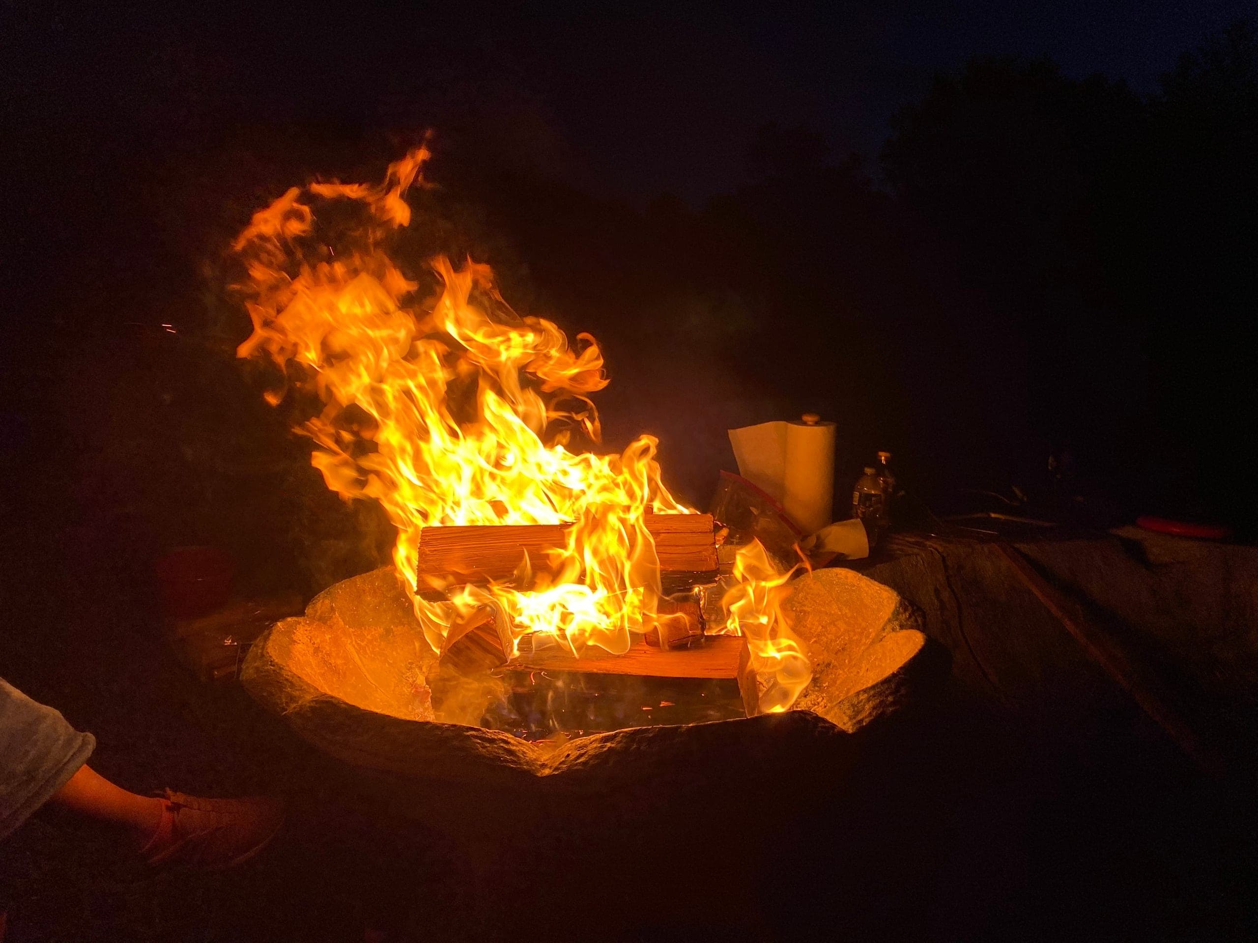 Fire pit by the pond at night